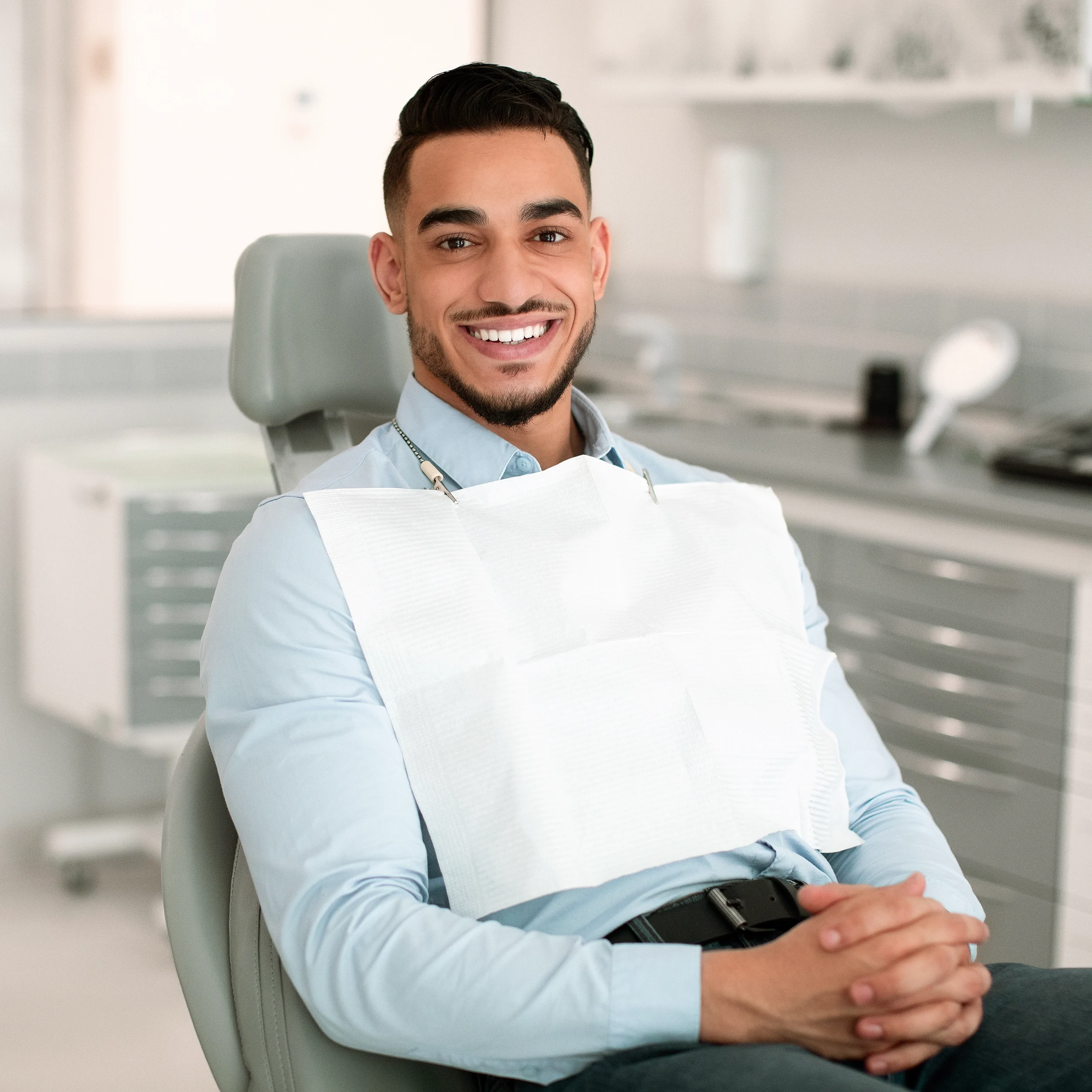 Man smiling in dental chair
